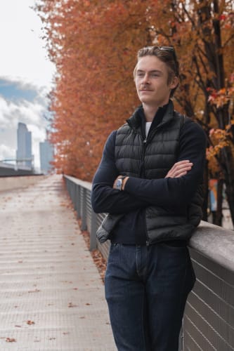An image of a portrait, urban, and travel engaged in walking in an outdoor setting.