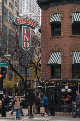 An image of a urban, culture, and street engaged in walking in a landmark.