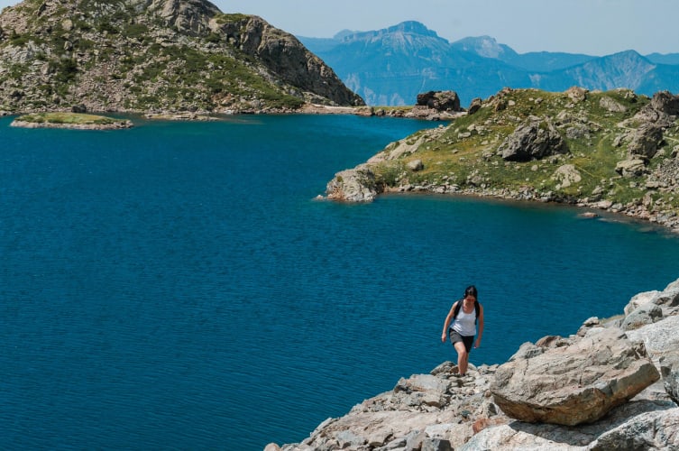 An image of a travel and landscape engaged in walking in a mountain.