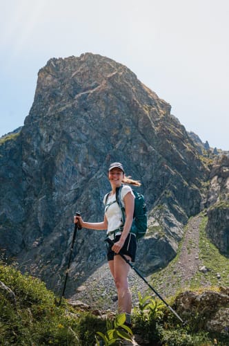 An image of a travel and self-portrait engaged in walking in a mountain.
