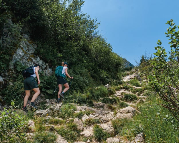 An image of a travel engaged in running in a mountain.