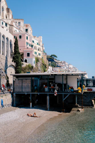 An image of a travel in a beach.