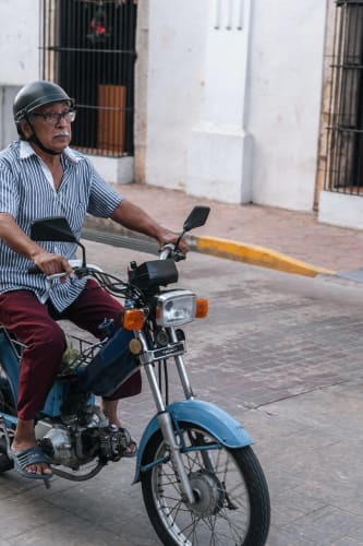 An image of a travel and street engaged in working.