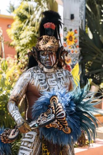 An image of a culture and travel engaged in dancing in a cultural site.