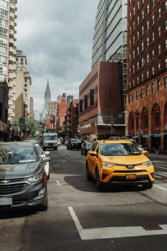 An image of a street, cityscape, urban, and travel engaged in walking.