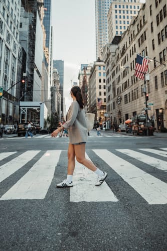 An image of a street and travel engaged in walking.