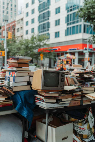 An image of a culture and urban engaged in reading in a workspace.