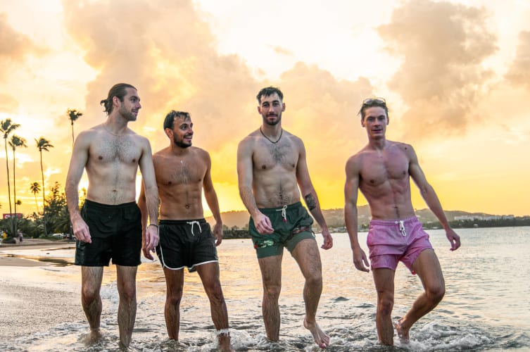 An image of a travel in a beach.