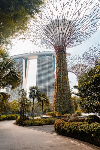 An image of a gardens, cityscape, and nature in a landmark.