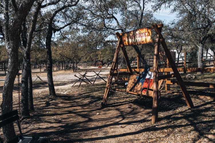 An image of a travel engaged in running in a park.