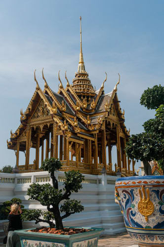 An image of a architecture and gardens in a cultural site.