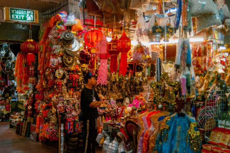 An image of a interior and travel engaged in craft in a workspace.