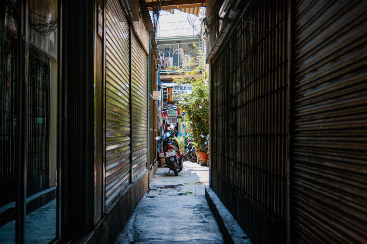 An image of a street, travel, and cityscape engaged in walking in a morning.