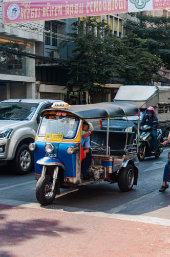 An image of a travel and street engaged in working in a city with a energetic atmosphere.