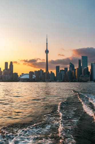 An image of a cityscape, urban, and travel in a sunset.