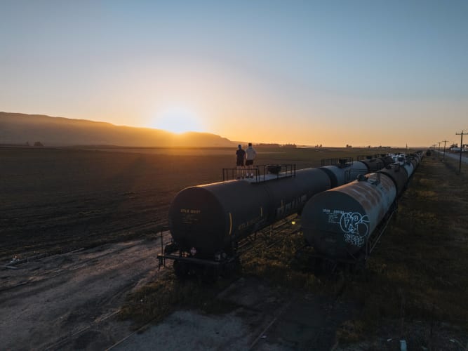 An image of a travel in a sunrise with a energetic atmosphere.