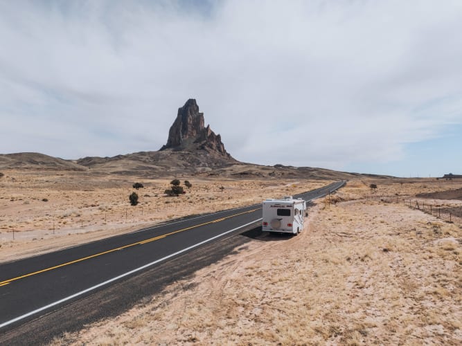 An image of a travel and landscape in a mountain with a serene and poetic feel.