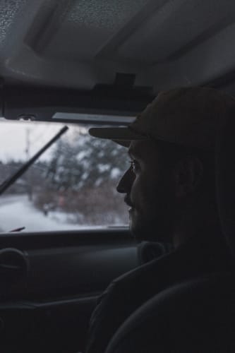 An image of a travel and self-portrait in a winter with a introspective and moody feel.