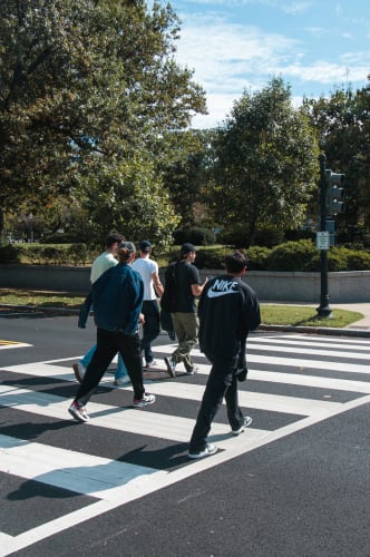 An image of a street and travel engaged in walking.