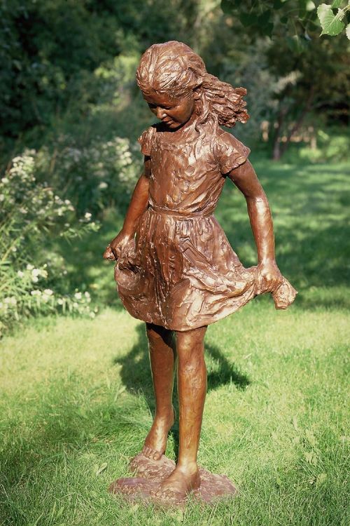 Girl In A Dress Looking Down.jpg