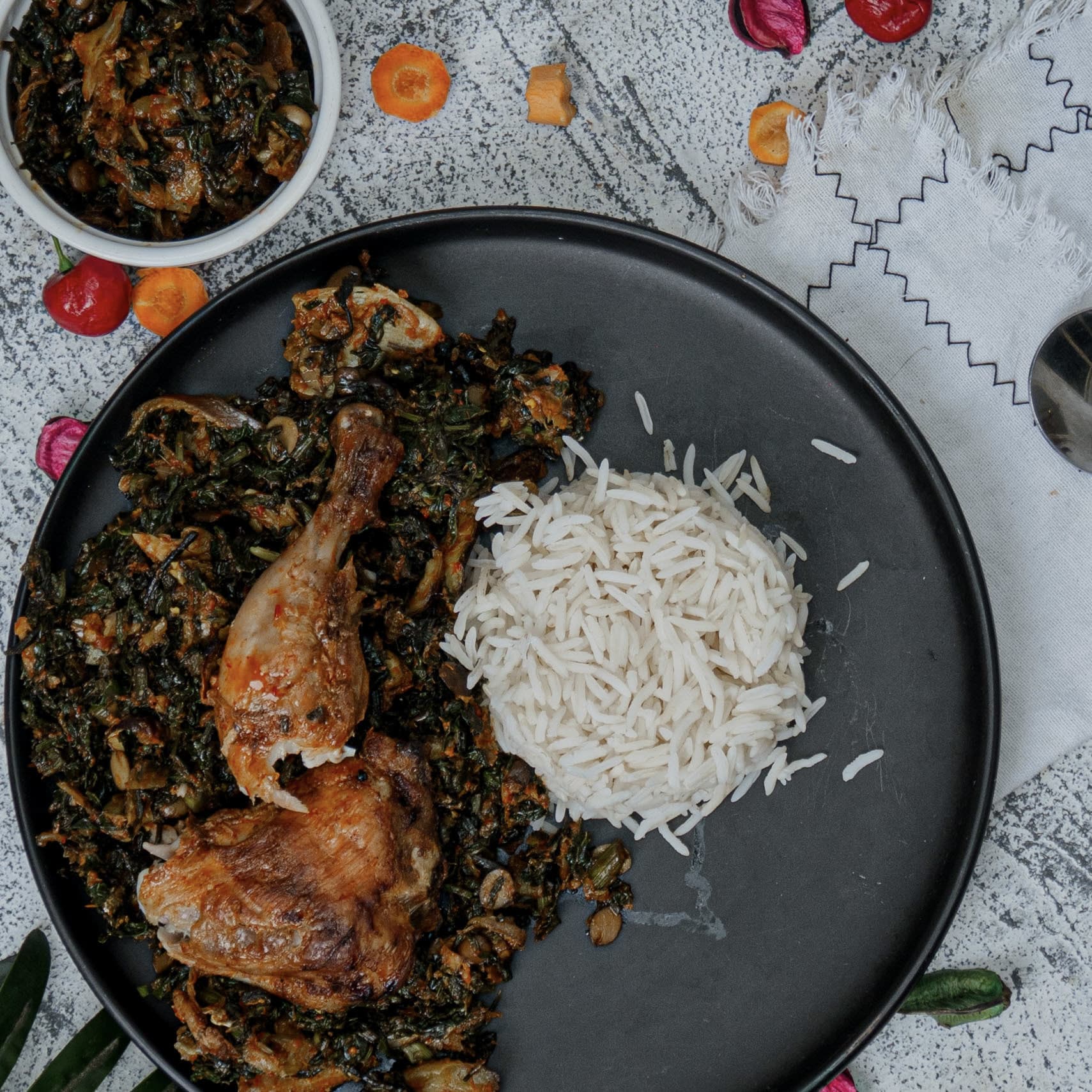 Basmati rice / oil-less efo riro / grilled chicken thighs
