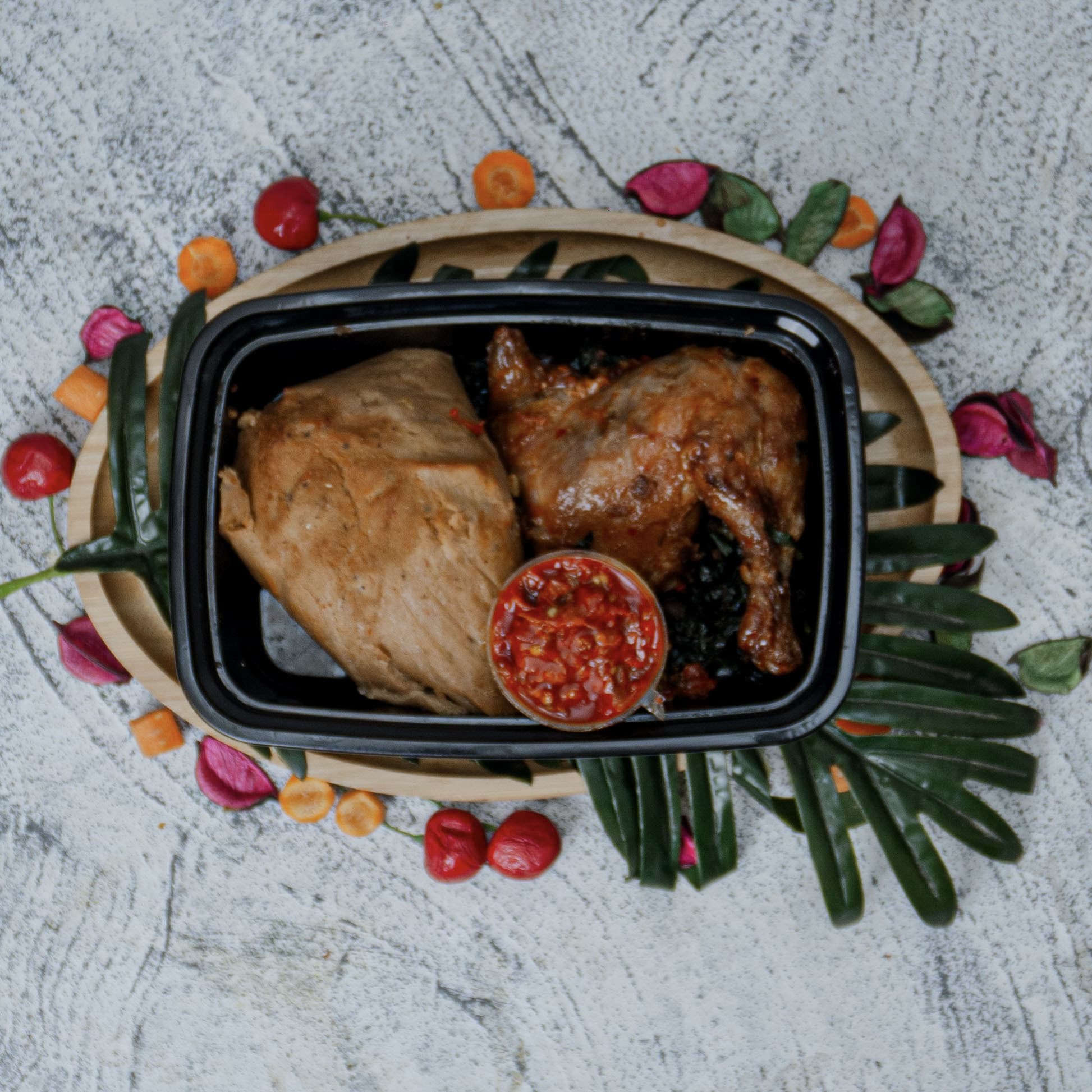 Moi-moi / chicken drum stick / leafy green veg