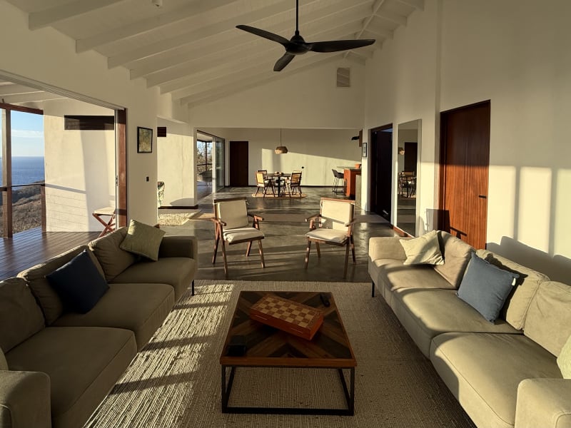Living room through to dining at sunrise