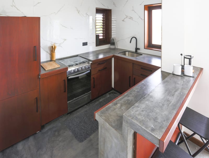 Garden flat kitchen viewed from the bar