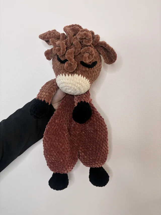 Crocheting Pattern 'Highland Cow Crochet Snuggler' on Pattern Paradise