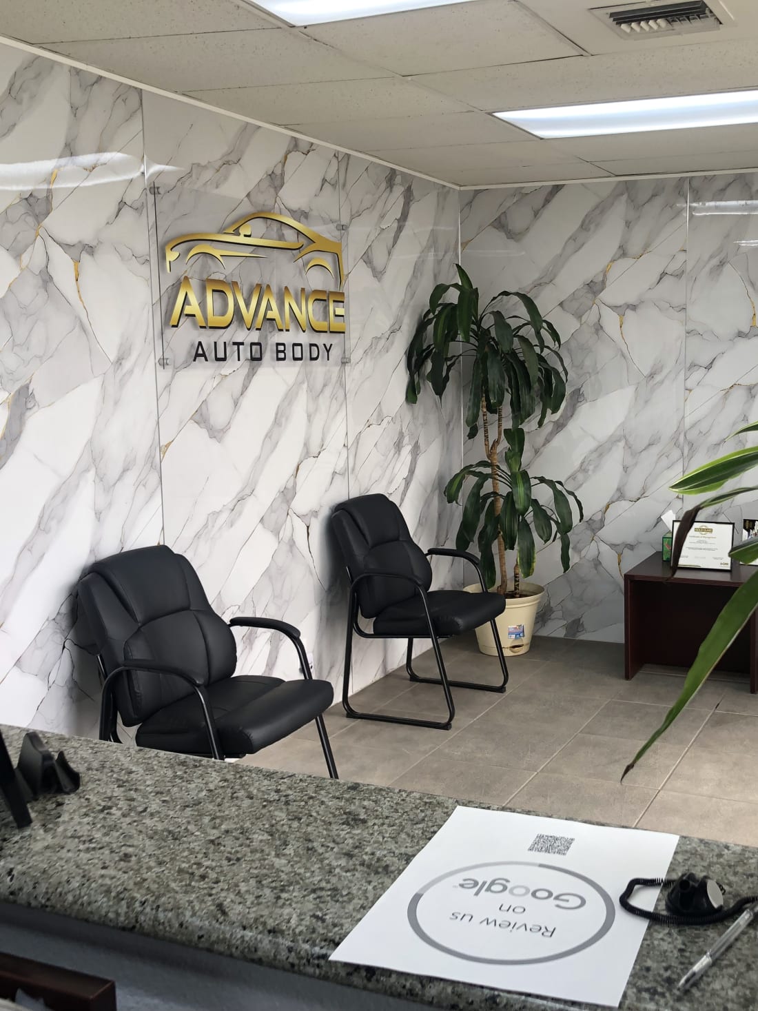 Inside the Advance Auto Body lobby in Santa Fe Springs