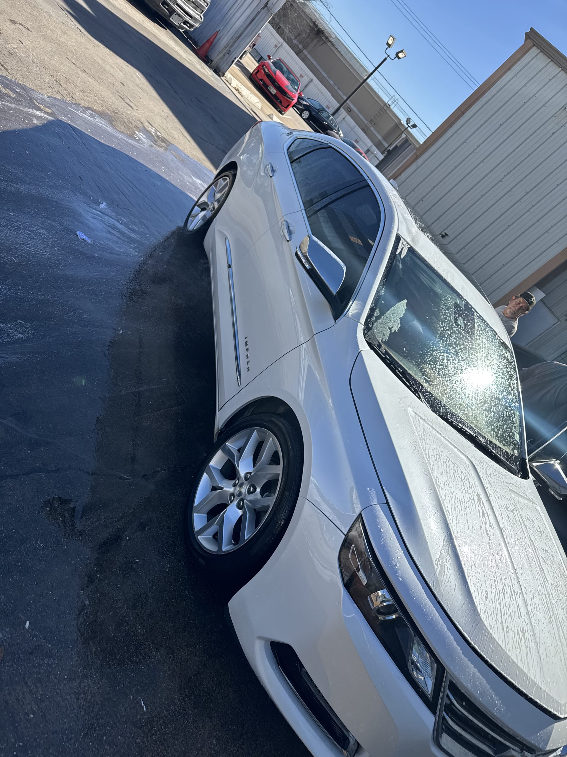 Completed white Impala repair — Elite Collision Houston