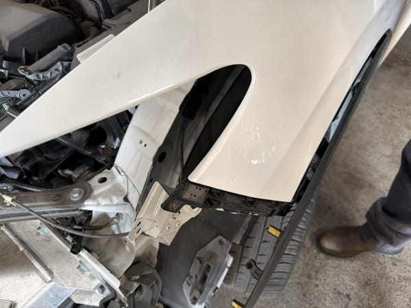 Fender removed showing frame structure