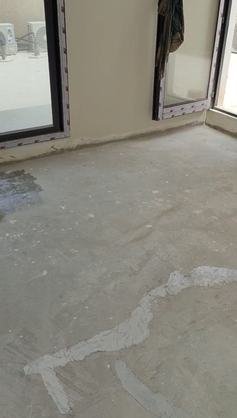 Existing studio floor before microcement flooring work in Dhahrat Laban, Riyadh