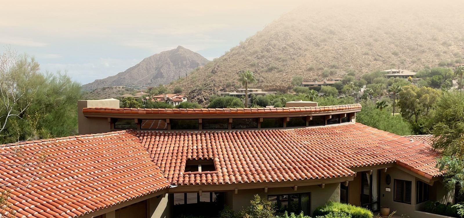 A Desert State Roofing crew on a roof
