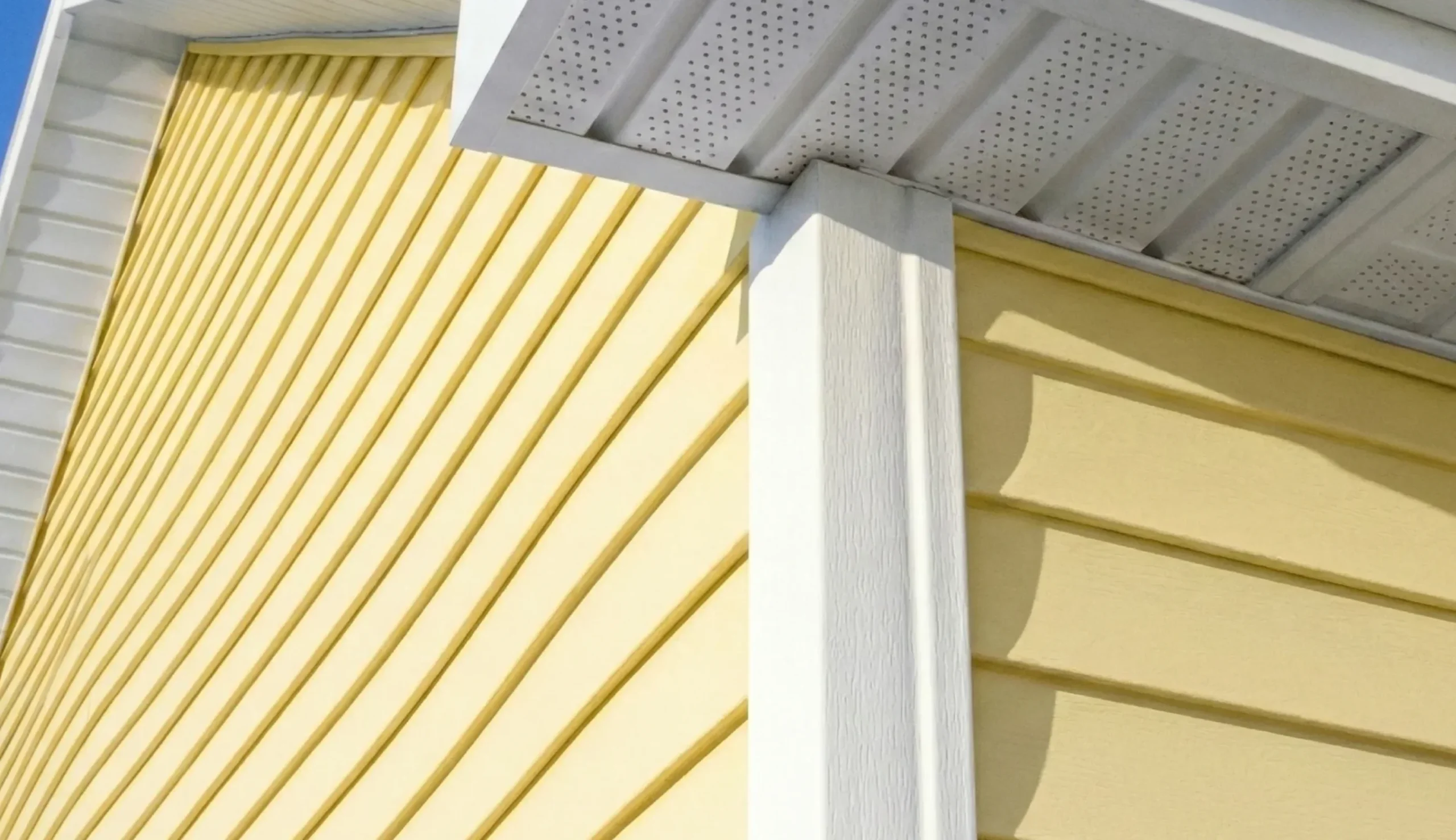 Newly installed siding on a home exterior