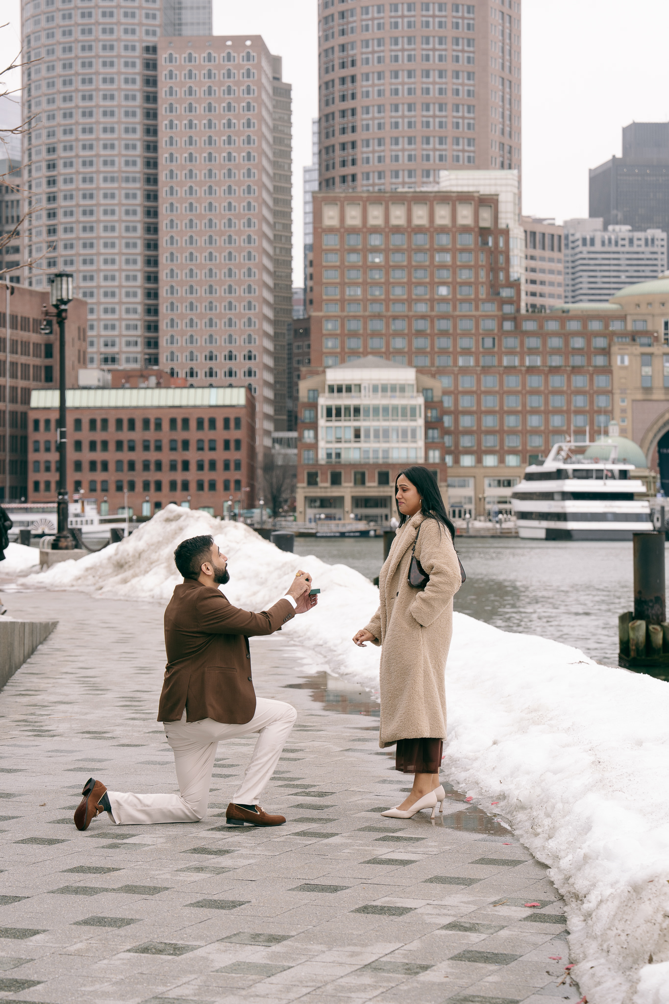 Jay walking with Amrita along the Seaport waterfront