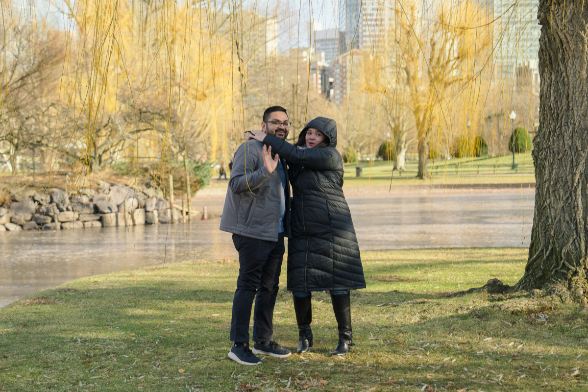 Newly engaged couple embracing