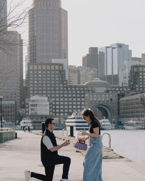 Surprise proposal photography for Chris and Hailey at Boston Seaport