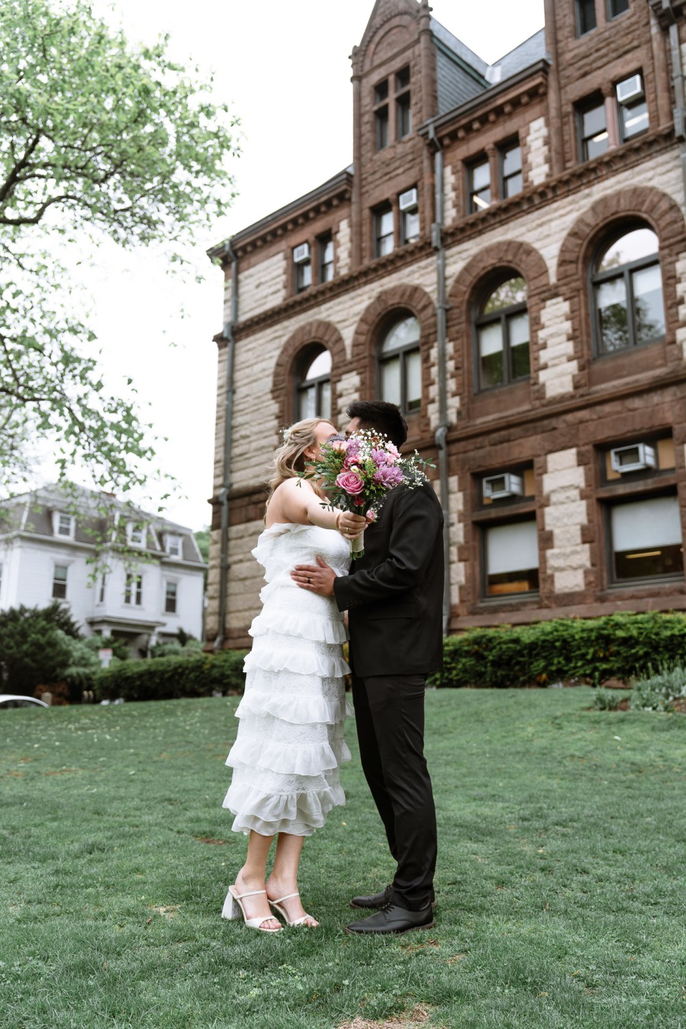 Newlyweds outside Cambridge City Hall