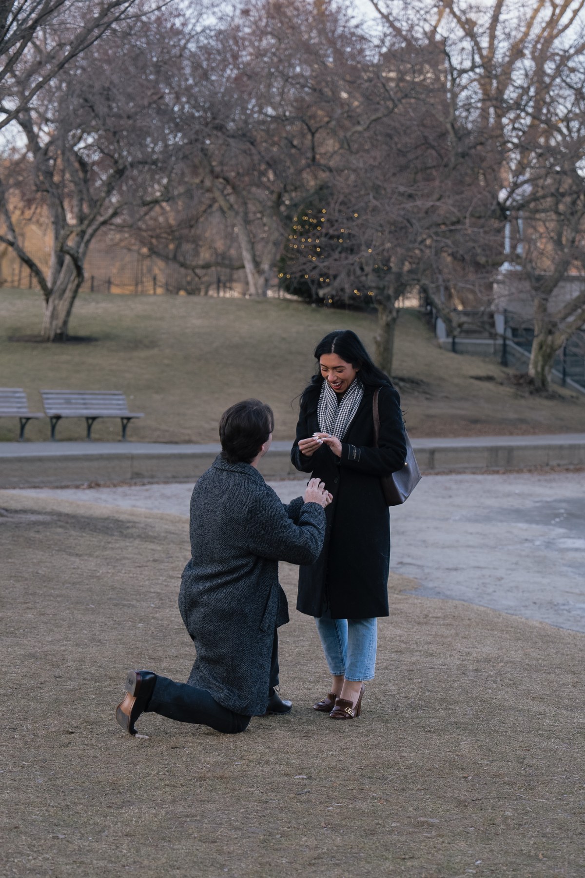 Tyler and Mariah during their Boston Public Garden proposal in warm afternoon light