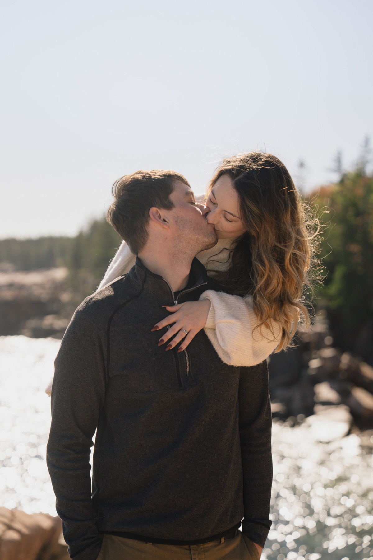 A couple at a coastal sunset