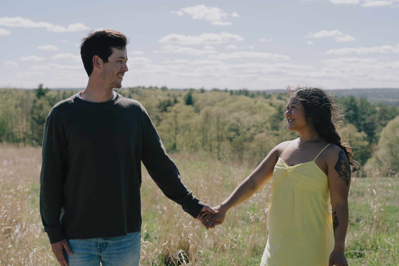 Candid portrait of Colin and Nikkie walking the garden paths