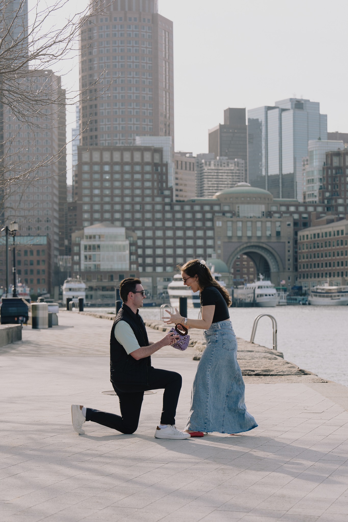 Chris proposing to Hailey at the Boston Seaport