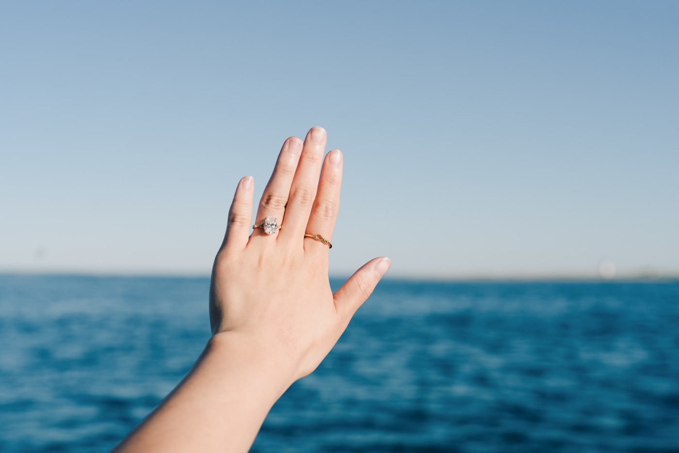 A sunset sailboat proposal on the water at Herring Cove, Provincetown
