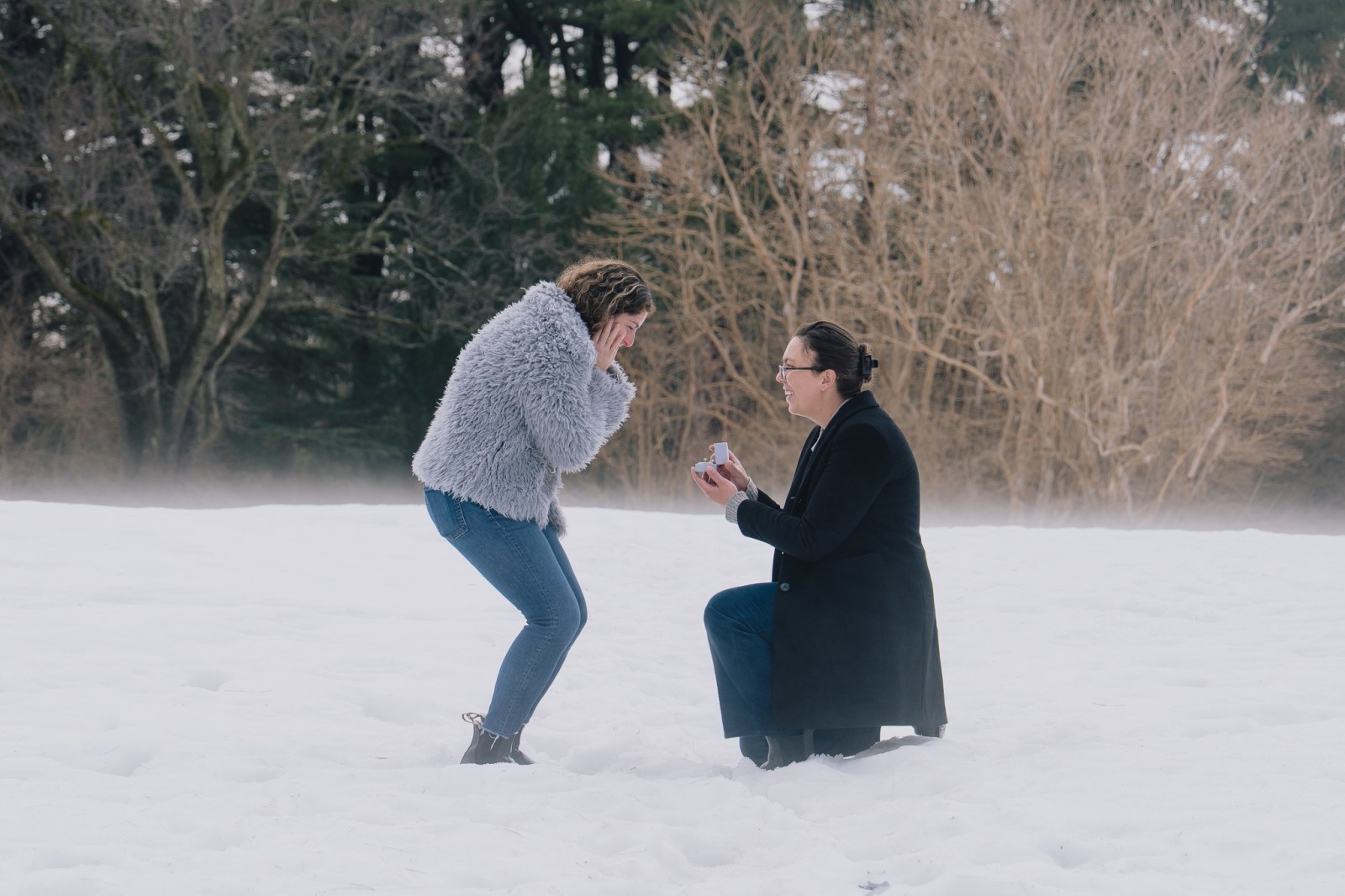 Laura leading Sara along the arboretum path