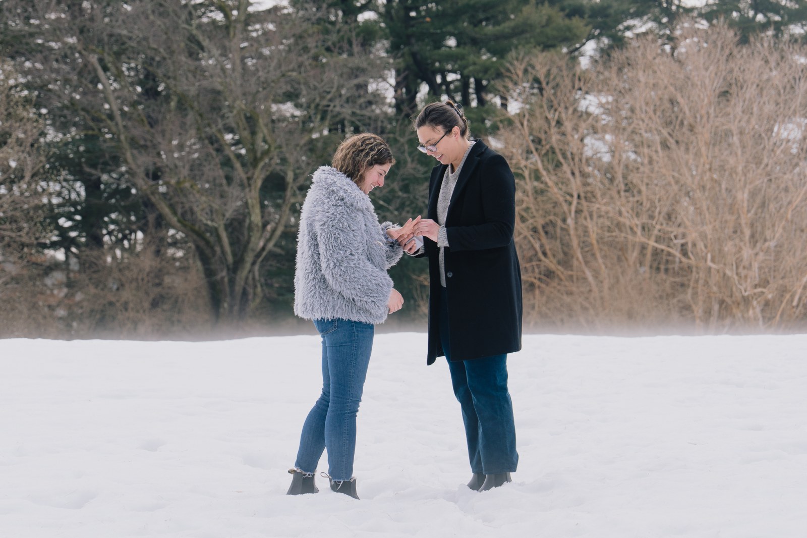 Laura on one knee during the surprise proposal