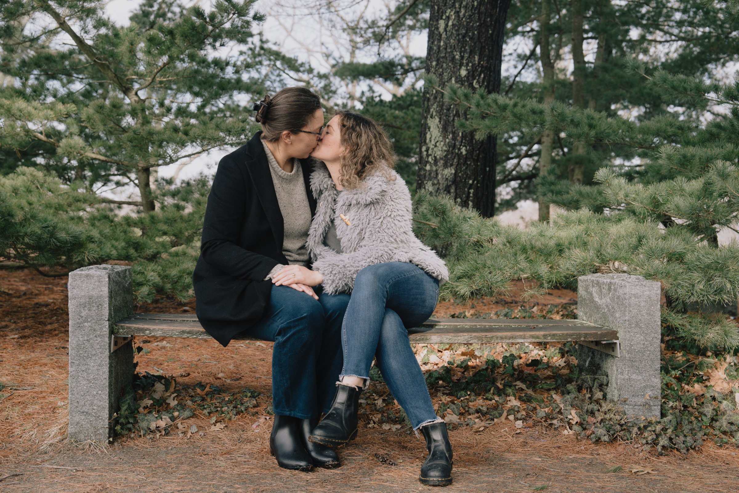 Intimate portrait of Laura and Sara on the arboretum trail