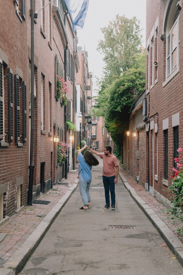 Alex and Kendyl walking through Beacon Hill