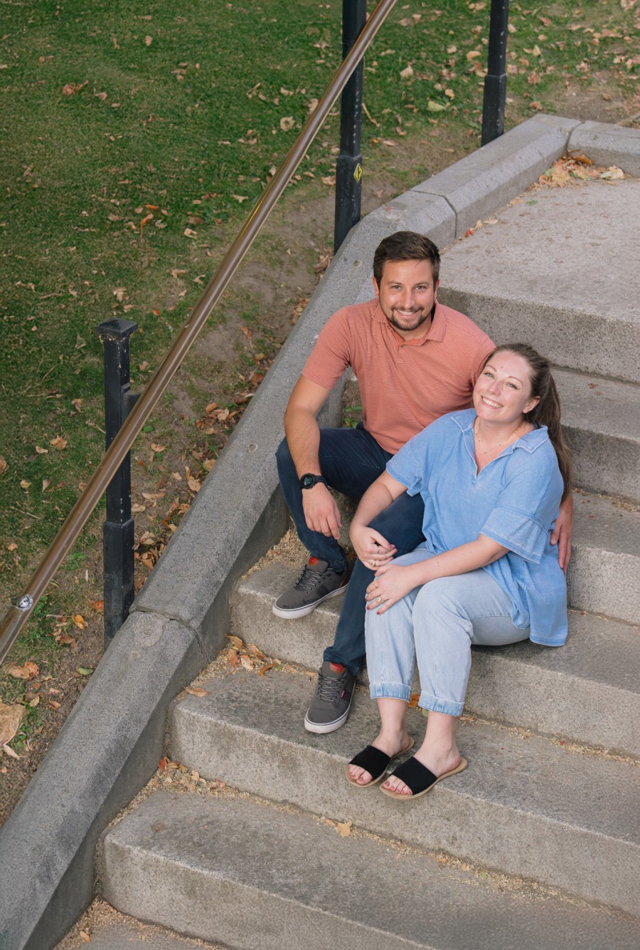 Alex and Kendyl sitting together for their final engagement portrait