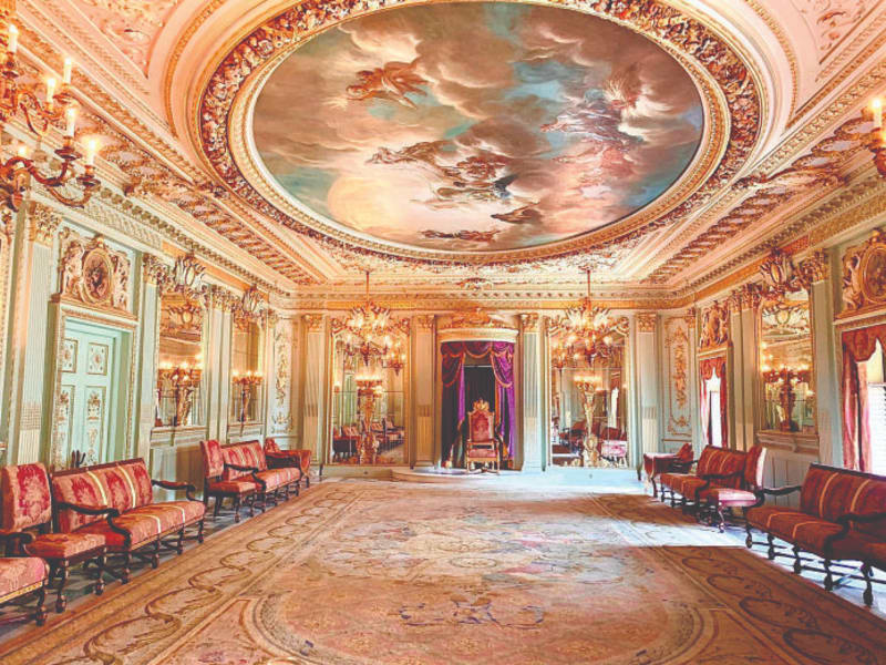 Royal interior with ornate ceiling